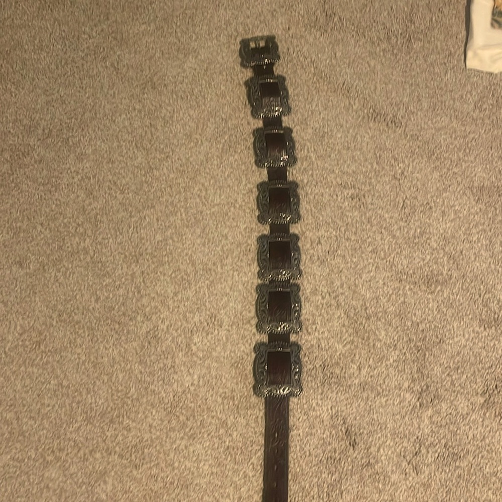 Brown leather Concho belt.  Very little wear
